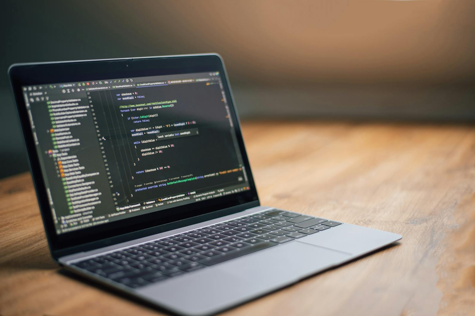 A laptop on a desk with a software update screen — photo by Daniil Komov on Pexels